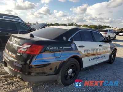 Trzecie zdjęcie samochodu z tyłu: 2015 FORD TAURUS POLICE INTERCEPTOR VIN:1FAHP2MK8FG159764 - miniatura