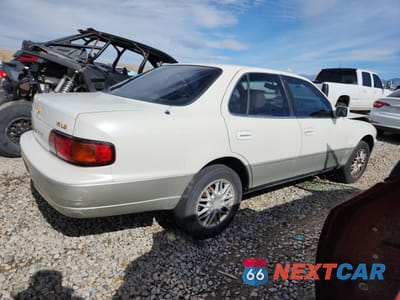 Trzecie zdjęcie samochodu z tyłu: 1996 TOYOTA CAMRY LE VIN:JT2BF12K9T0134918 - miniatura