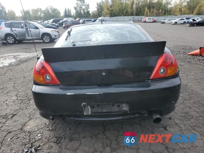 Zdjęcie 6 z 13 samochodu: 2003 HYUNDAI TIBURON VIN:KMHHN65F13U077098 - miniatura