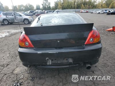 Zdjęcie 6 z 13 samochodu: 2003 HYUNDAI TIBURON VIN:KMHHN65F13U077098 - miniatura