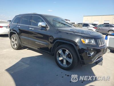 Czwarte zdjęcie samochodu z boku: 2014 JEEP GRAND CHEROKEE LIMITED VIN:1C4RJEBG3EC573783 - miniatura
