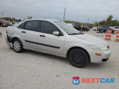 Czwarte zdjęcie samochodu z boku: 2005 FORD FOCUS ZX4 VIN:1FAFP34N85W150025 - miniatura