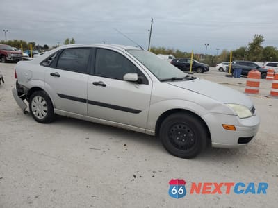 Czwarte zdjęcie samochodu z boku: 2005 FORD FOCUS ZX4 VIN:1FAFP34N85W150025 - miniatura