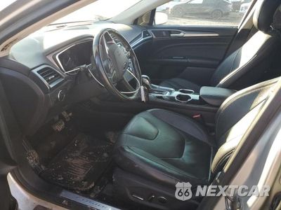 Zdjęcie 7 z 11 samochodu: 2013 FORD FUSION TITANIUM PHEV VIN:3FA6P0SU5DR274134 - miniatura