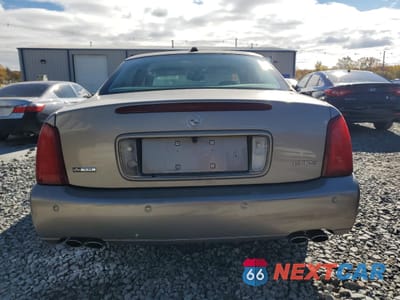Zdjęcie 6 z 12 samochodu: 2004 CADILLAC DEVILLE DTS VIN:1G6KF57984U225065 - miniatura
