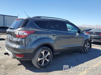 Trzecie zdjęcie samochodu z tyłu: 2017 FORD ESCAPE SE VIN:1FMCU9G9XHUB01640 - miniatura