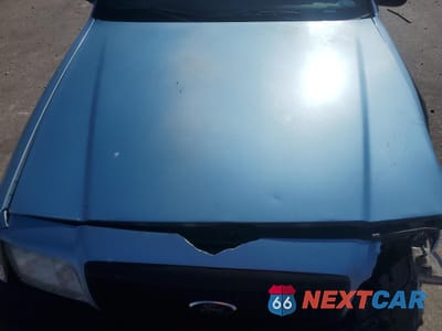 Zdjęcie 11 z 12 samochodu: 2003 FORD CROWN VICTORIA POLICE INTERCEPTOR VIN:2FAFP71W83X143257 - miniatura