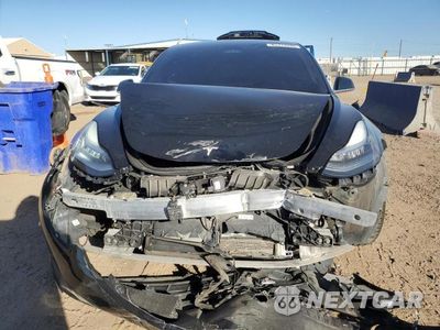 Piąte zdjęcie samochodu w środku: 2019 TESLA MODEL 3 VIN:5YJ3E1EBXKF365336 - miniatura