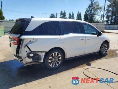 Trzecie zdjęcie samochodu z tyłu: 2021 HONDA ODYSSEY EXL VIN:5FNRL6H74MB017068 - miniatura