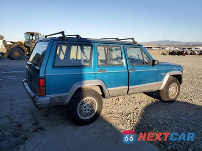 Trzecie zdjęcie samochodu z tyłu: 1994 JEEP CHEROKEE COUNTRY VIN:1J4FT78S2RL102874 - miniatura