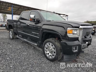 Czwarte zdjęcie samochodu z boku: 2016 GMC SIERRA K2500 DENALI VIN:1GT12UE8XGF216658 - miniatura