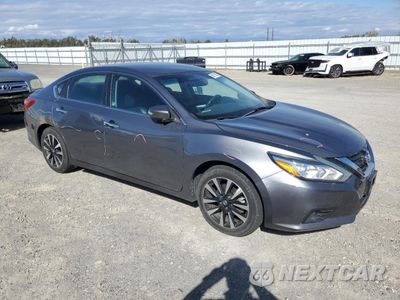 Czwarte zdjęcie samochodu z boku: 2018 NISSAN ALTIMA 2.5 VIN:1N4AL3AP5JC155027 - miniatura