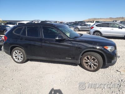 Czwarte zdjęcie samochodu z boku: 2014 BMW X1 XDRIVE28I VIN:WBAVL1C51EVY20072 - miniatura