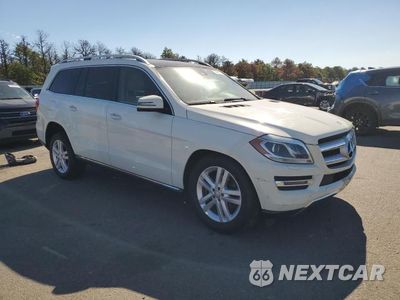 Czwarte zdjęcie samochodu z boku: 2013 MERCEDES-BENZ GL-CLASS VIN:4JGDF2EE8DA184695 - miniatura