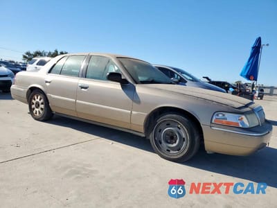 Czwarte zdjęcie samochodu z boku: 2003 MERCURY GRAND MARQUIS LS VIN:2MEFM75WX3X608844 - miniatura