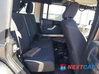 Zdjęcie 10 z 11 samochodu: 2016 JEEP WRANGLER UNLIMITED SAHARA VIN:1C4BJWEG3GL268452 - miniatura