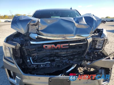 Zdjęcie 12 z 13 samochodu: 2021 GMC YUKON SLT VIN:1GKS2BKD7MR139627 - miniatura