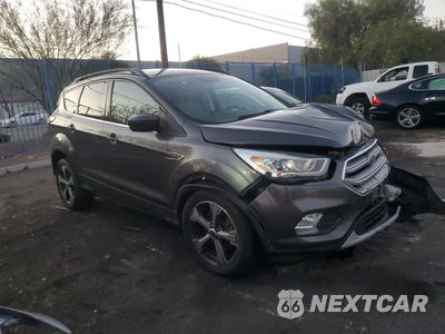 Czwarte zdjęcie samochodu z boku: 2017 FORD ESCAPE SE VIN:1FMCU9G9XHUB01640 - miniatura