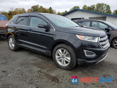Czwarte zdjęcie samochodu z boku: 2018 FORD EDGE SEL VIN:2FMPK4J91JBC24256 - miniatura