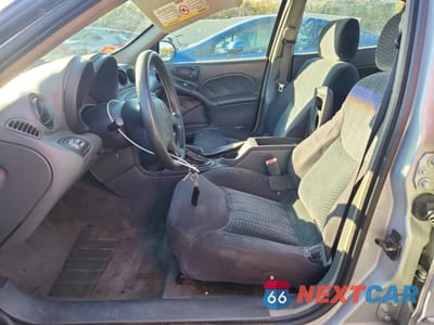 Zdjęcie 7 z 12 samochodu: 2003 PONTIAC GRAND AM SE VIN:1G2NE52F63C205318 - miniatura