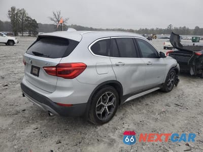 Trzecie zdjęcie samochodu z tyłu: 2016 BMW X1 XDRIVE28I VIN:WBXHT3C36GP880899 - miniatura