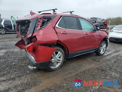 Trzecie zdjęcie samochodu z tyłu: 2018 CHEVROLET EQUINOX PREMIER VIN:2GNAXWEX3J6157580 - miniatura