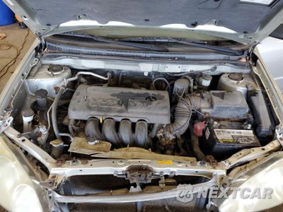 Zdjęcie 11 z 12 samochodu: 2003 TOYOTA COROLLA CE VIN:JTDBR32E732008565 - miniatura