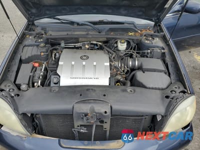 Zdjęcie 11 z 12 samochodu: 2004 CADILLAC DEVILLE VIN:1G6KD54Y74U247303 - miniatura