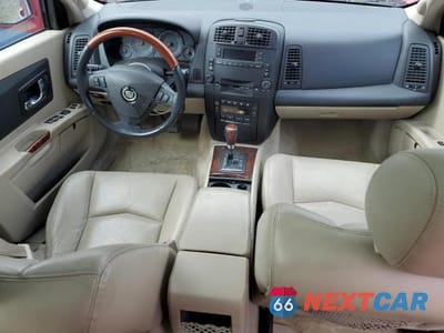 Zdjęcie 8 z 13 samochodu: 2004 CADILLAC SRX VIN:1GYDE637740136463 - miniatura