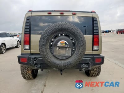 Zdjęcie 6 z 13 samochodu: 2005 HUMMER H2 VIN:5GRGN23U95H126939 - miniatura