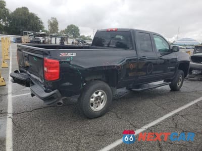Trzecie zdjęcie samochodu z tyłu: 2016 CHEVROLET SILVERADO K1500 LT VIN:1GCVKREC7GZ260327 - miniatura
