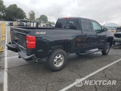 Trzecie zdjęcie samochodu z tyłu: 2016 CHEVROLET SILVERADO K1500 LT VIN:1GCVKREC7GZ260327 - miniatura