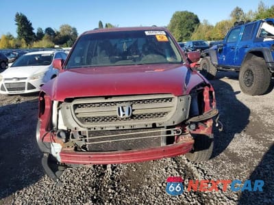 Piąte zdjęcie samochodu w środku: 2005 HONDA PILOT EX VIN:2HKYF18415H548808 - miniatura