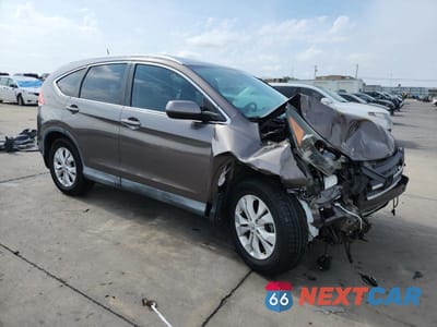 Czwarte zdjęcie samochodu z boku: 2014 HONDA CR-V EXL VIN:2HKRM3H79EH551603 - miniatura