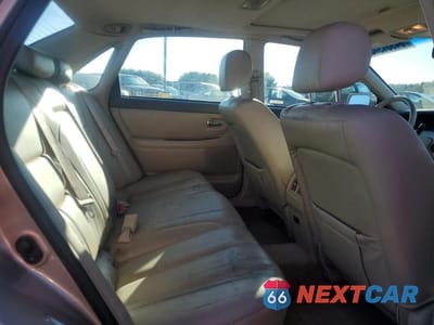 Zdjęcie 10 z 12 samochodu: 2000 TOYOTA AVALON XLS VIN:4T1BF28B3YU072030 - miniatura