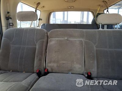Zdjęcie 10 z 13 samochodu: 2000 FORD EXCURSION XLT VIN:1FMNU41S9YEA47930 - miniatura