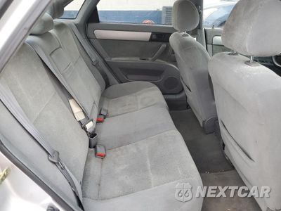 Zdjęcie 10 z 12 samochodu: 2004 SUZUKI FORENZA S VIN:KL5JD52Z74K982191 - miniatura