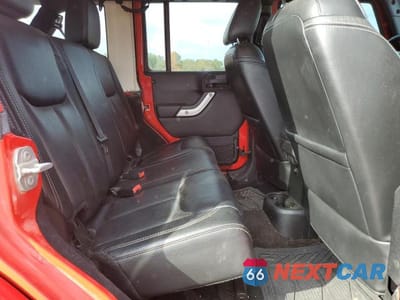 Zdjęcie 10 z 11 samochodu: 2015 JEEP WRANGLER UNLIMITED SAHARA VIN:1C4BJWEG7FL685877 - miniatura