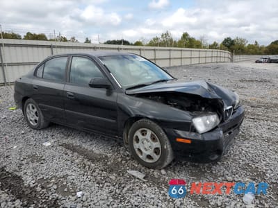 Czwarte zdjęcie samochodu z boku: 2002 HYUNDAI ELANTRA GLS VIN:KMHDN45D72U427687 - miniatura