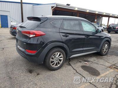 Trzecie zdjęcie samochodu z tyłu: 2017 HYUNDAI TUCSON LIMITED VIN:KM8J3CA43HU286134 - miniatura