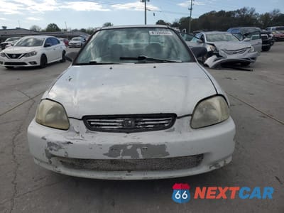 Piąte zdjęcie samochodu w środku: 1997 HONDA CIVIC LX VIN:2HGEJ6679VH509356 - miniatura