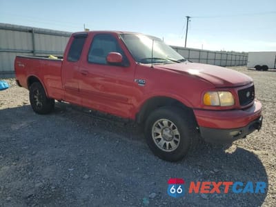Czwarte zdjęcie samochodu z boku: 2002 FORD F150 VIN:1FTRX18W42NA15396 - miniatura