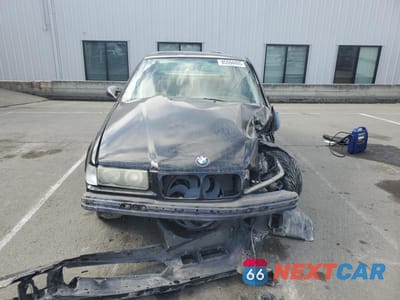 Piąte zdjęcie samochodu w środku: 1994 BMW 325 I VIN:WBACB3325RFE19235 - miniatura