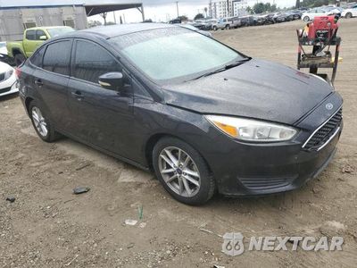 Czwarte zdjęcie samochodu z boku: 2016 FORD FOCUS SE VIN:1FADP3F29GL387931 - miniatura