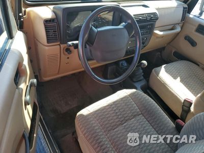 Zdjęcie 8 z 13 samochodu: 2000 JEEP WRANGLER / TJ SE VIN:1J4FA29P2YP709559 - miniatura