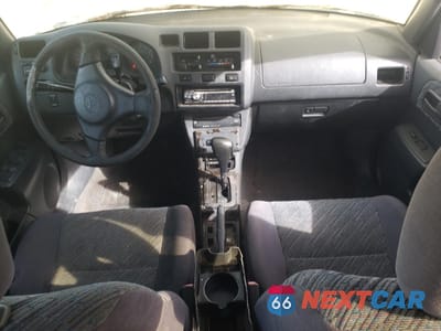 Zdjęcie 8 z 13 samochodu: 1999 TOYOTA RAV4 VIN:JT3GP10V2X7054952 - miniatura