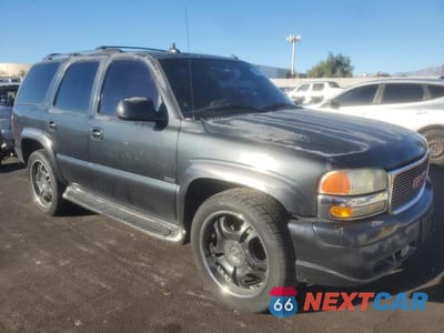 Czwarte zdjęcie samochodu z boku: 2003 GMC YUKON VIN:1GKEC13Z73R127636 - miniatura