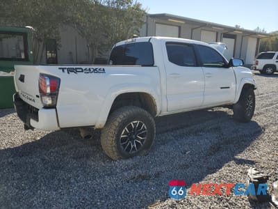 Trzecie zdjęcie samochodu z tyłu: 2023 TOYOTA TACOMA DOUBLE CAB VIN:3TMCZ5AN5PM576944 - miniatura