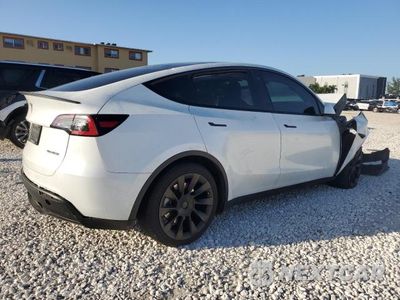 Trzecie zdjęcie samochodu z tyłu: 2023 TESLA MODEL Y VIN:7SAYGDEE6PA027192 - miniatura