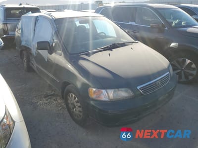 Czwarte zdjęcie samochodu z boku: 1997 HONDA ODYSSEY EX VIN:JHMRA1875VC007073 - miniatura